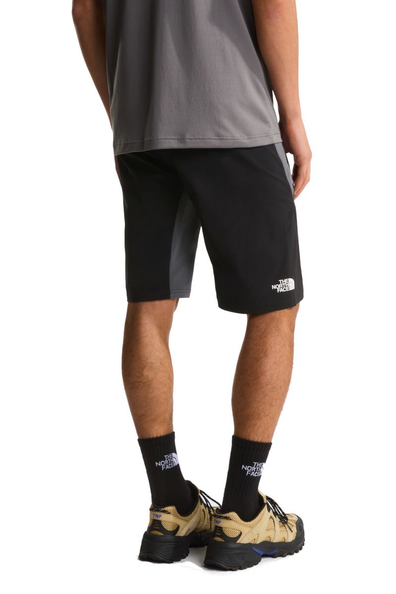 SPODENKI FELIK SLIM TAPERED SHORT-SMOKED PEARL-TNF BLACK